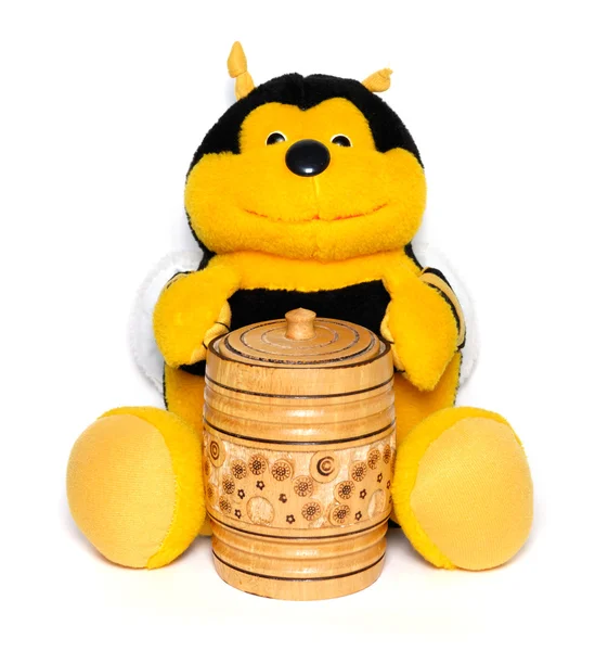 De pluche honingbij met een vat honing — Stockfoto