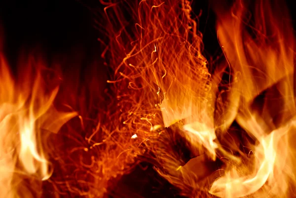 Close-up van brand op een zwarte — Stockfoto