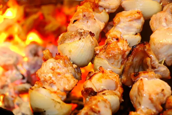 Meat is fried on fire — Stock Photo, Image