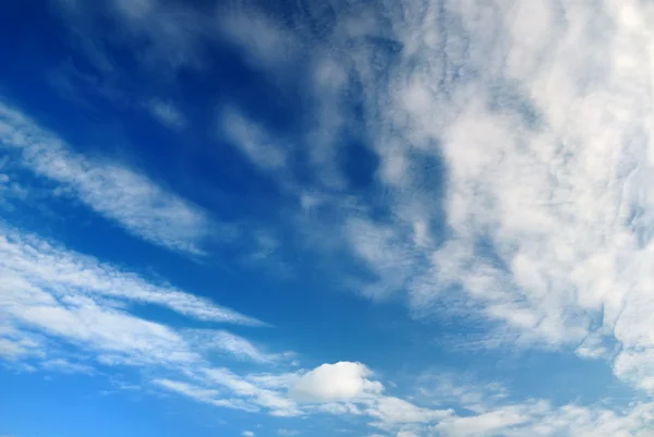 Soft white clouds against blue sky — Stock Photo, Image