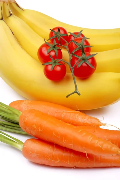 Bunch of bananas, tomatoes and carrot — Stock Photo, Image