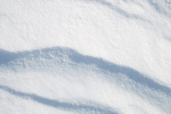 Achtergrond van de heldere scheen sneeuw — Stockfoto