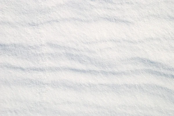 Фон из яркого сияющего снега — стоковое фото