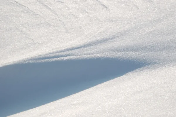 Achtergrond van de heldere scheen sneeuw — Stockfoto