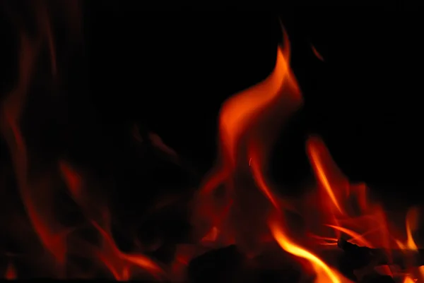 Close-up of fire on a black — Stock Photo, Image