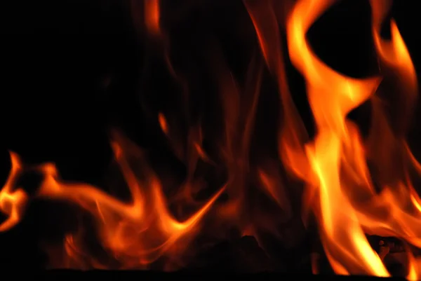 Close-up of fire on a black — Stock Photo, Image