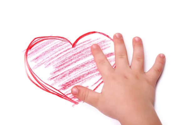 The children's hand is located in heart drawing — Stock Photo, Image