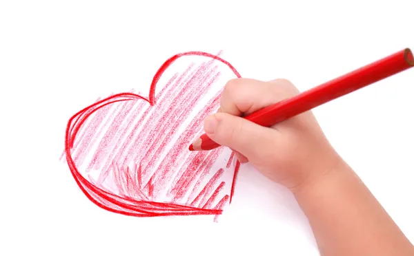 Kinderhand mit Bleistift zieht das Herz an — Stockfoto