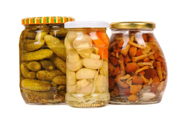 A set of canned vegetables. cucumbers, mushrooms and carrots. — Stock Photo, Image