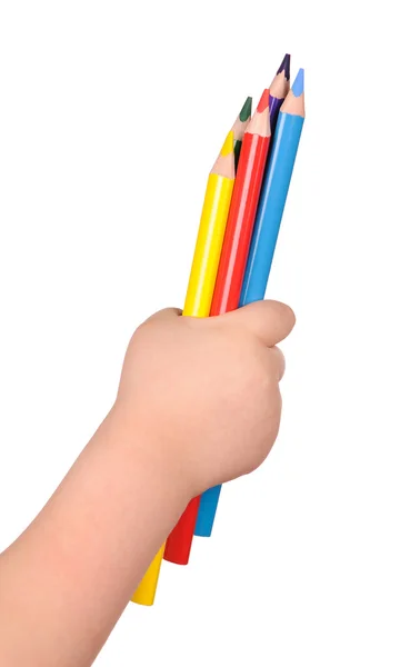 Children's hand holds the colorful pencils — Stock Photo, Image