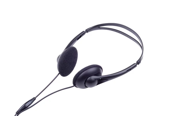 Black generic headphones on white — Stock Photo, Image