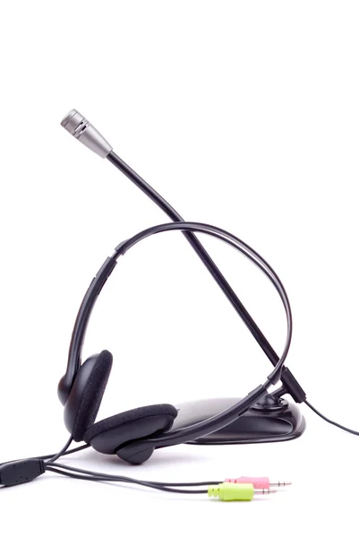 Black generic headphones and microphone — Stock Photo, Image