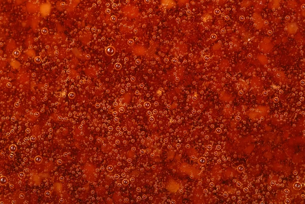 Fundo de geleia vermelha com bolhas — Fotografia de Stock
