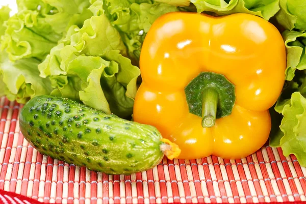 Yellow pepper, cucumber and greens — Stock Photo, Image
