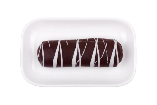 Beyaz bir plaka üzerinde bir çikolatalı kurabiye — Stok fotoğraf