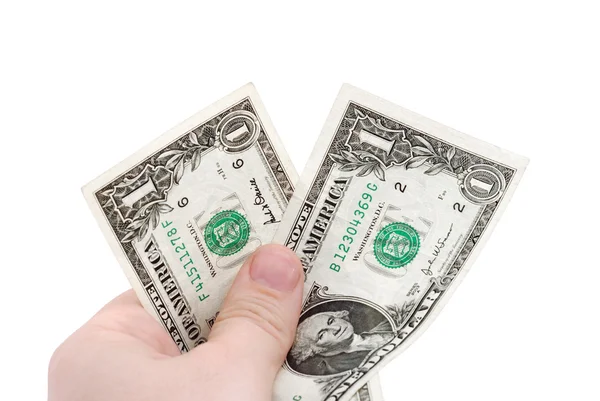 The hand holds two dollars — Stock Photo, Image