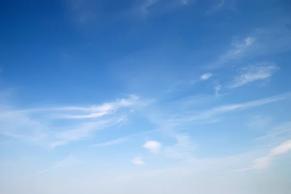 Soft white clouds against blue sky — Stock Photo, Image