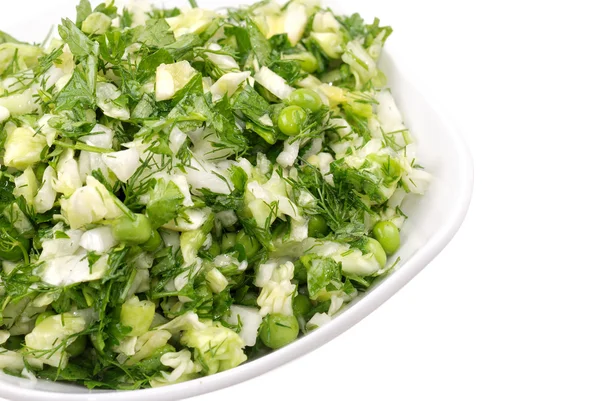 Taze salata sebze ve yeşillik bir plaka üzerinde — Stok fotoğraf
