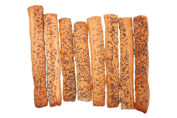 Palitos de pan salados con semillas de amapola aisladas en blanco — Foto de Stock