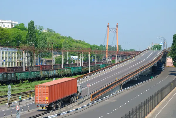 Transportation of cargoes by rail and lorry — Stock Photo, Image