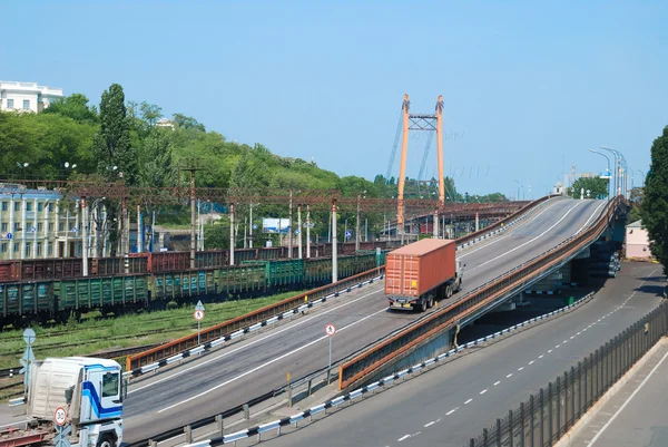Transportation of cargoes by rail and lorry — Stock Photo, Image
