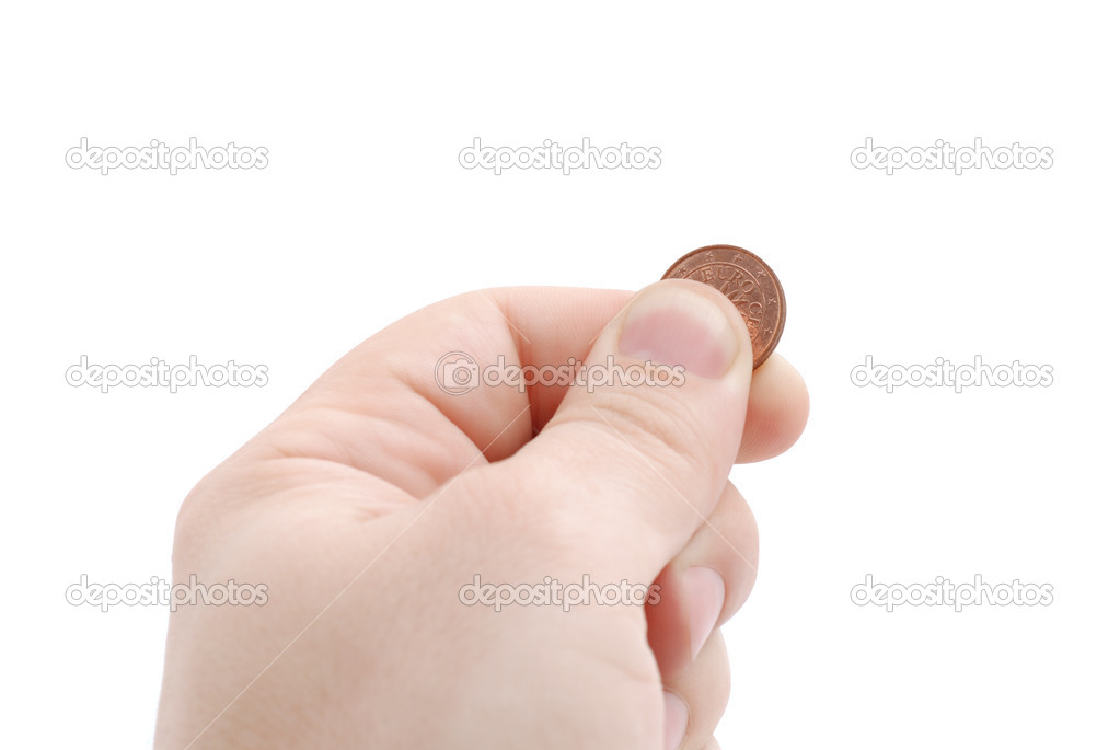 The hand holds euro cent