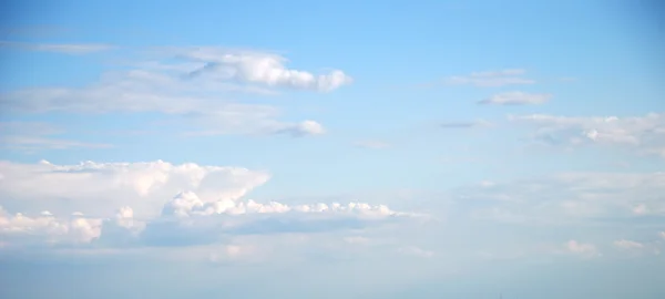 Soft white clouds against blue sky — Stock Photo, Image