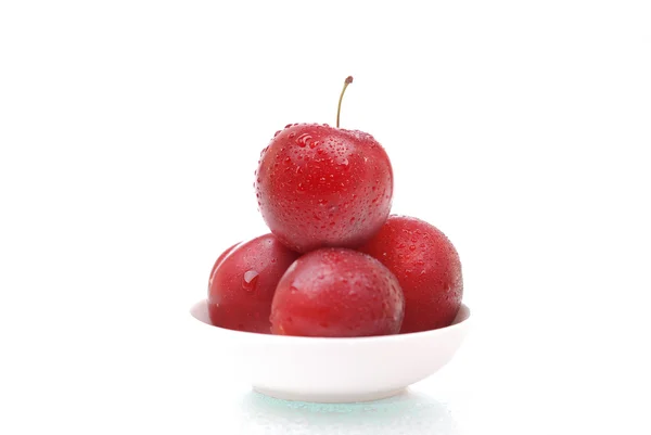 Ripe and juicy plums on white — Stock Photo, Image