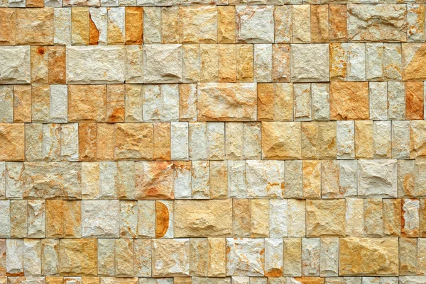 Фон из желтой кирпичной стены — стоковое фото
