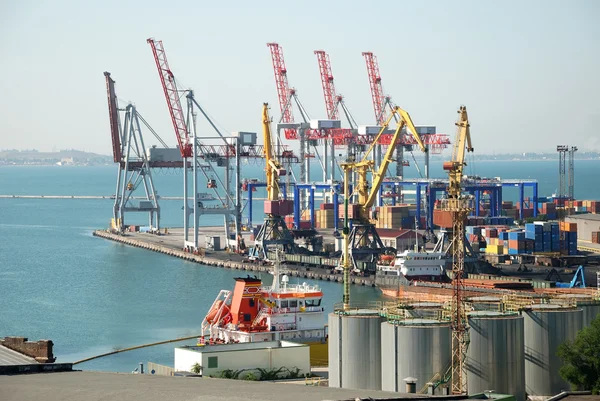 Port warehouse with cargoes and containers — Stock Photo, Image