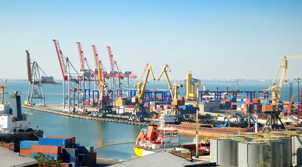 Port warehouse with cargoes and containers — Stock Photo, Image