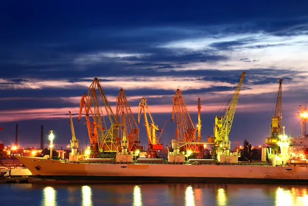 Port warehouse with cargoes and containers — Stock Photo, Image