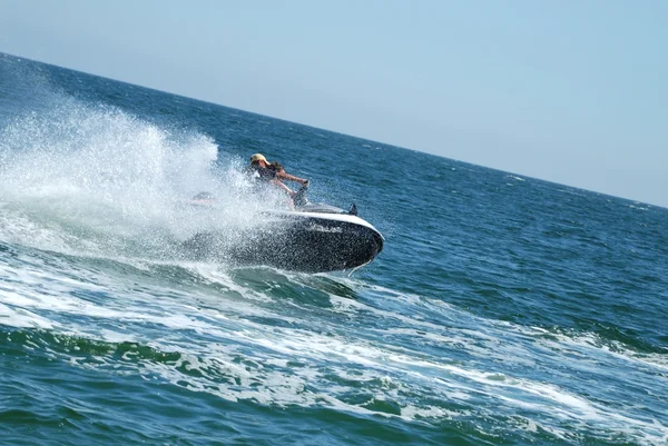 Man on a high speed jet ski — Stock Photo, Image