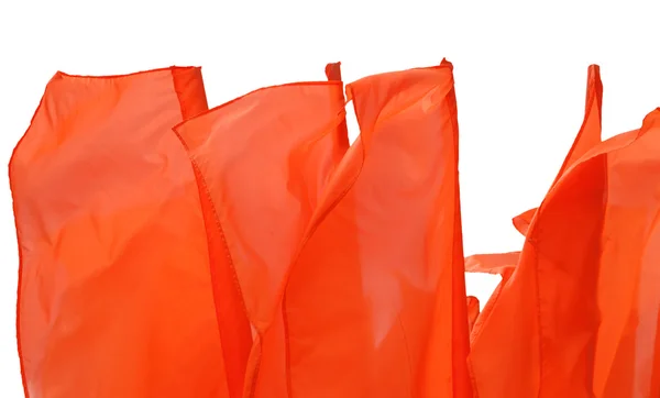 Bandera roja ondeando sobre un viento aislado — Foto de Stock