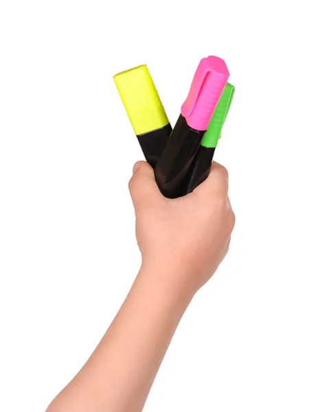 Children's hand holds the colorful markers — Stock Photo, Image