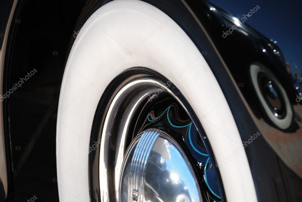 Chrome rims with whitewall tire