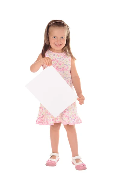 Little girl holding a sheet of paper — Stock Photo, Image