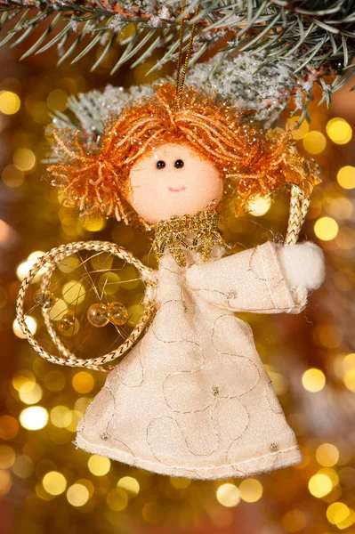 Christmas angel on fir tree branch — Stock Photo, Image