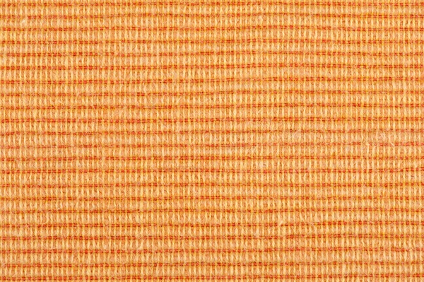 オレンジ色の縞模様のファブリックの背景 — ストック写真