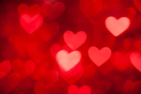 Red bokeh of hearts background — Stock Photo, Image