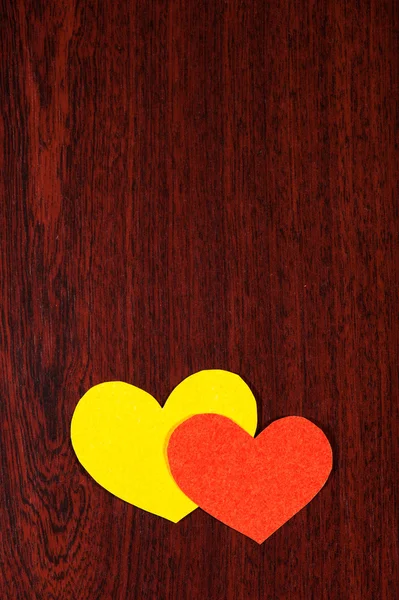 Dwa serca na tle drewniane — Zdjęcie stockowe