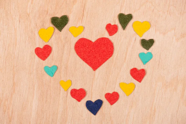 Set of hearts on wooden background — Stock Photo, Image