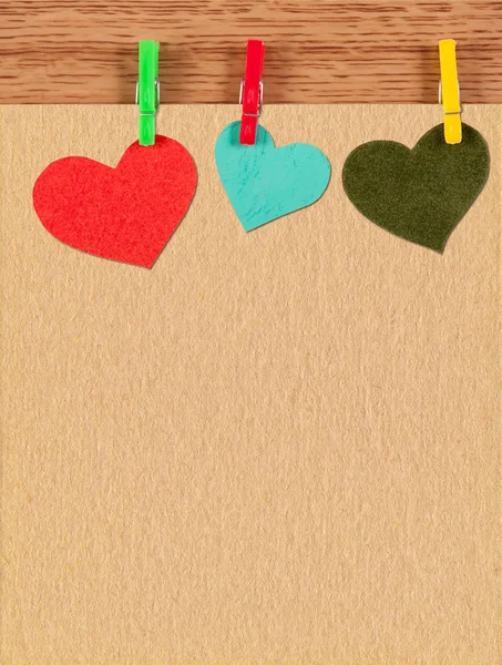 Card with hearts on wooden background — Stock Photo, Image