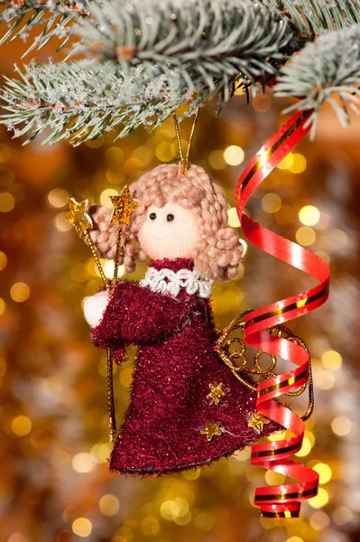 Christmas angel on fir tree branch — Stock Photo, Image