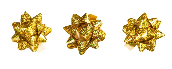 Golden bows made of shiny ribbon — Stock Photo, Image