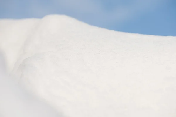 Snowdrift on sky background — Stock Photo, Image