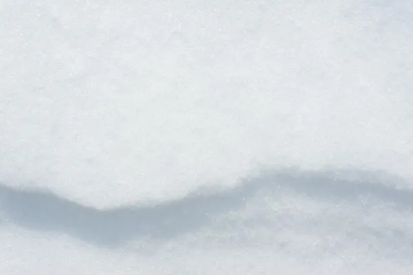 Snow with shadow curve as background — Stock Photo, Image