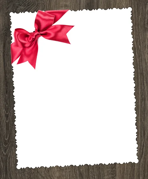 Foglio di carta bianco con fiocco rosso — Foto Stock