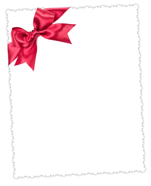 Foglio di carta bianco con fiocco rosso — Foto Stock