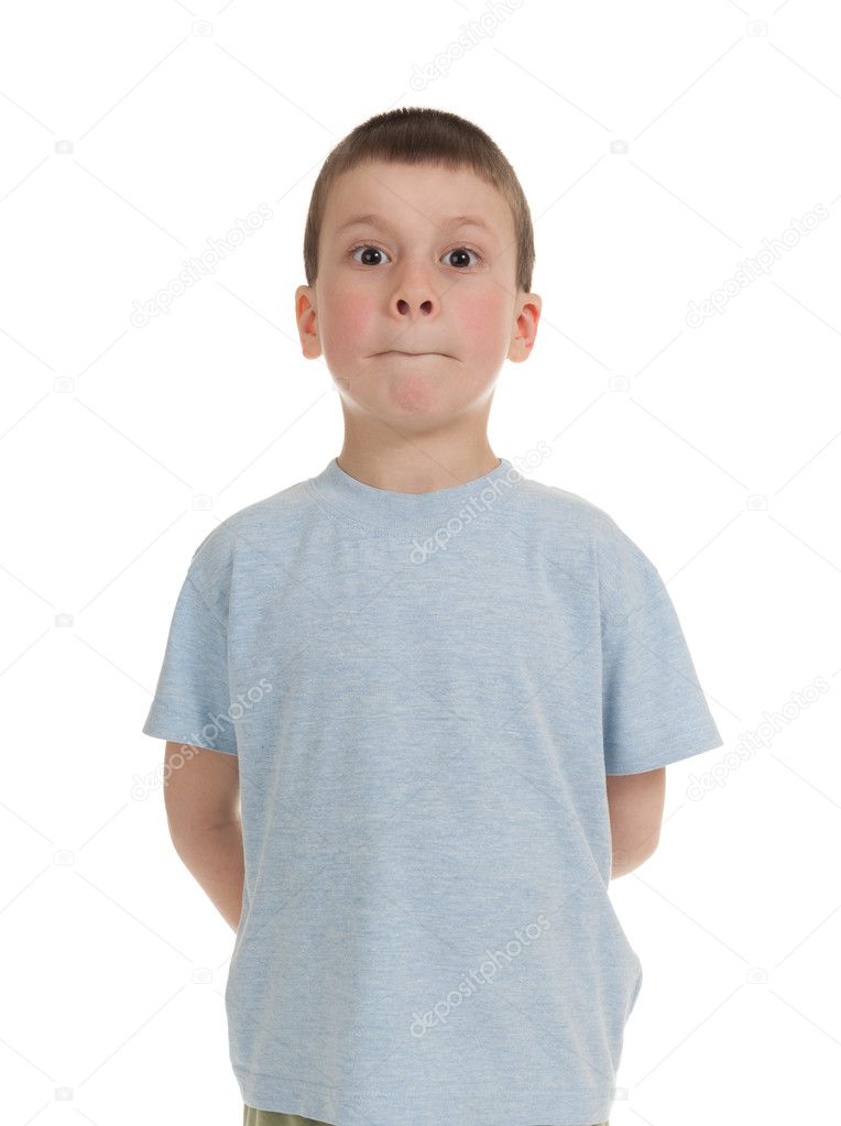 boy with his mouth tightly closed